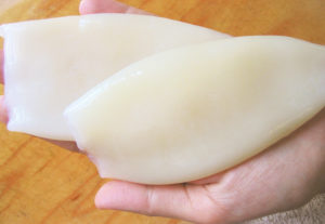 Recovery of collagen from squid skin