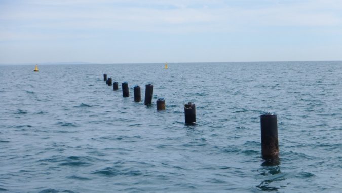 A surface-level view of OSL's customized configuration of 250-liter HDPE floats designed to withstand the extreme forces of waves and storms.